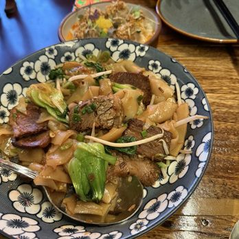 Tiger Fork signature dishes Crispy Beef, Kowloon Buns, Beef Chow Foon, Bubble Waffle
